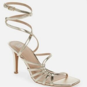 Gold strappy high heels